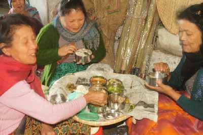 Mizo market women taking their lunch at Bara Bazar in Aizawl, Mizoram (North-Eastern India