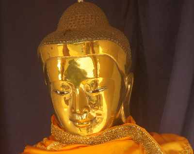 Buddha Statue with golden polished face, in side temple of Ram Zadi Buddhist Stupa near Bandarban (Chittagong Hill Tracts, Bangladesh)