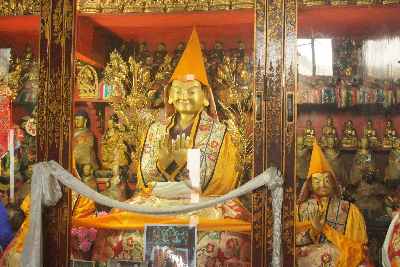 Yellow hat statue in Buddhist Tibetan Temple Gaden Phelgayling Namgyal Tatsang in Bodhgaya, Bihar (Northern India)