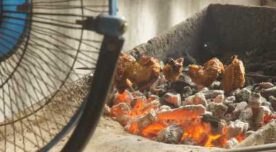 Nepali Food: Grilling goat meat on a stick (sekuwa) 