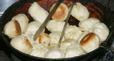 Indian / Tibetan food: Momo fried at a streetside foodstall
