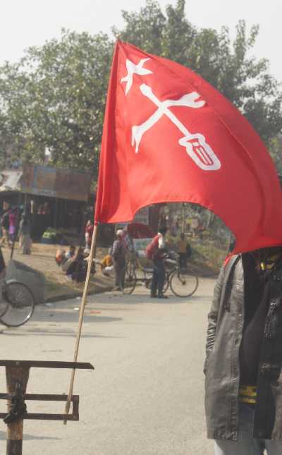 Red Strike Flag in the Tarai region near Kakarbhitta, Nepal
