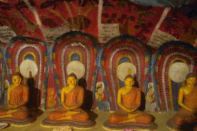 Gallery of small Buddha staues in third chamber of Dhowa Raja Maha Viharaya Temple, near Ella and Bandarawela, Hill Country, Sri Lanka