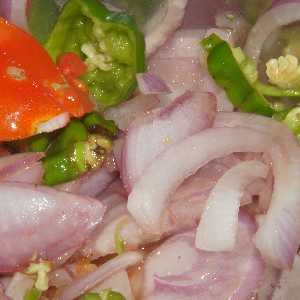 Sri Lankan Food: Salad from Onions, Tomatoes and Nayi Miris (Capsicum chinense)