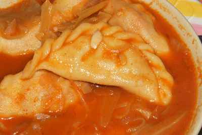 Indian / Korean Tourist Food: Kimchi Manduguk (Kimchi soup and kimchi stuffed mandu noodles)