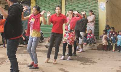 Young people dncing on the street in Imphal (Manipur, North Eastern India)