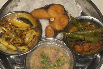 Indian / Manipuri food: Fried potatoes, soupy sish curry and Iromba (fermented fish curry)  