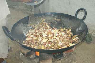 Nepali food: Potato curry at temple festival (Kuwa near Janakpur)