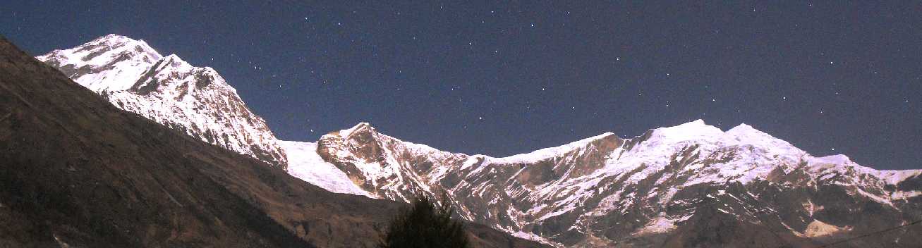 Moonlight Panorama of the Himalayan mountains near Lete (Mustang, Nepal): Dhaulagiri and Tukuche Peak