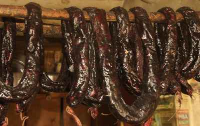 Nepali/Thakali Food: Drying Kindi (yak blood sausage) 