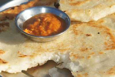 Nepali/Magar food: Sweet chamal roti (rice roti) with spicy tomato Chutney
