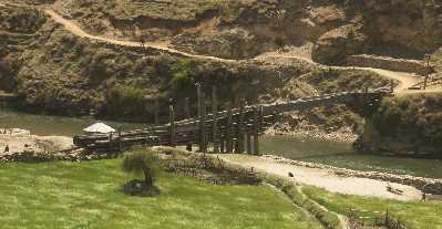 Wooden bridge crossing Tila stream, seen from Karnali Highway, Western Nepal