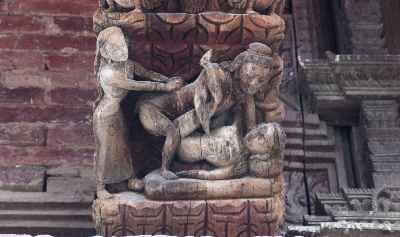 Erotic woodcarving at Jagannath Mandir temple at Durbar Sqare in Kathmandu (Nepal)