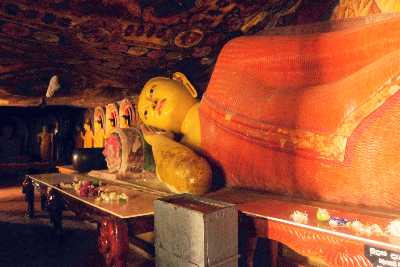 Cave Temple (#1) with reclining Buddha in Aluvihare Buddhist Monastery near Matale, Sri Lanka