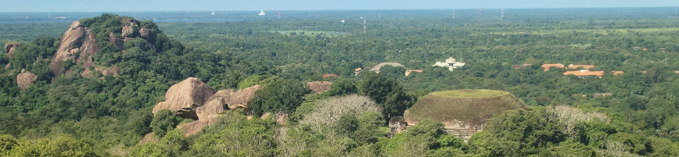 View from Mihintale (Cultural Triangle) to the West, showing Kanthaka Chaitya and Dagobas of Anuradhapura, Sri Lanka