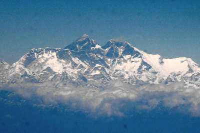 The Sagarmatha massif in the Mahalangur Himal, showing Nuptse, Mt. Everest and Lhotse seen from the South (aircraft from Dhaka to Kathmandu) (Himalaya, Nepal)