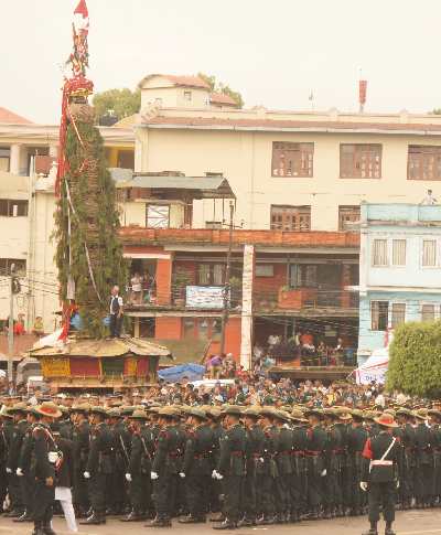 Military parade around ceremonial chariot (Ratha) during the Rato Machendranath Jatra festival in Patan, Kathmandu Valley, Nepal