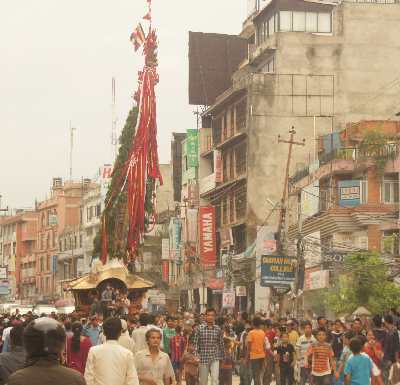 Chariot (Ratha) is moved through the crowded streets during the Rato Machindranath Jatra festival in Patan, Kathmandu Valley, Nepal