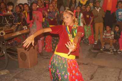 Girl dancing at Diwali Hindu Festival (Tihar) in Pokhara, Nepal