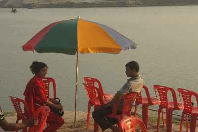 Students enjoying view across Podda river (Ganga) in Rajshahi, Bangladesh