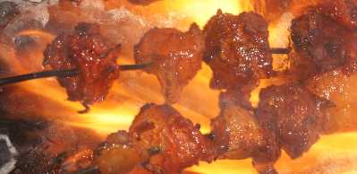 Nepali/Magar Food: Charcoal-grilled marinated pork cubes (Pork Sekuwa) 