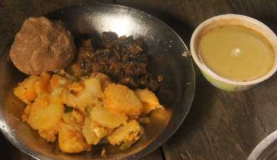 Nepali/Sherpa Food: Polda (Tsampa ball) with potatoes and beef and butter tea