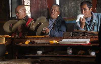 Gong and Conch music during Buddhist Puja temple ceremony in Tarke Ghyang, Helambu, Nepal