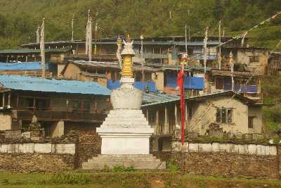 Buddhist Stupa and Mani Wall in front of Tarke Gyang (Sherpa village in Helambu, Nepal)