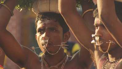 Face piercings at Hindu street festival in Trincomalee (Trinco, Tirukonamalai), Eastern Sri Lanka