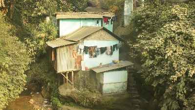 Shabby houses in Tura (West Garo Hills, Meghalaya, North-Eastern India)