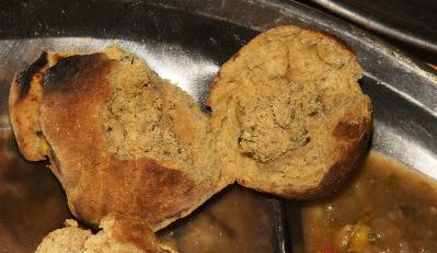 Indian Food: Bati (bread balls) stuffed with a dal (lentile) spice mix